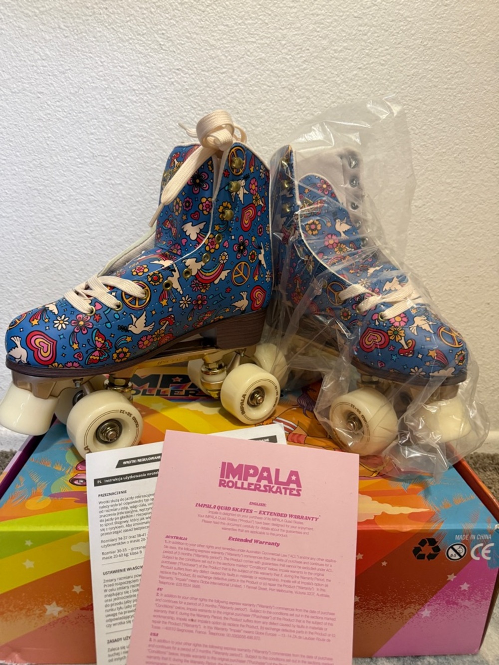Impala Blue Floral Peace Roller Skates